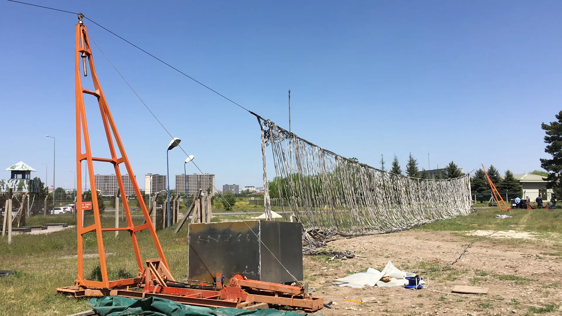 Lifting stanchion holding the net in the raised position